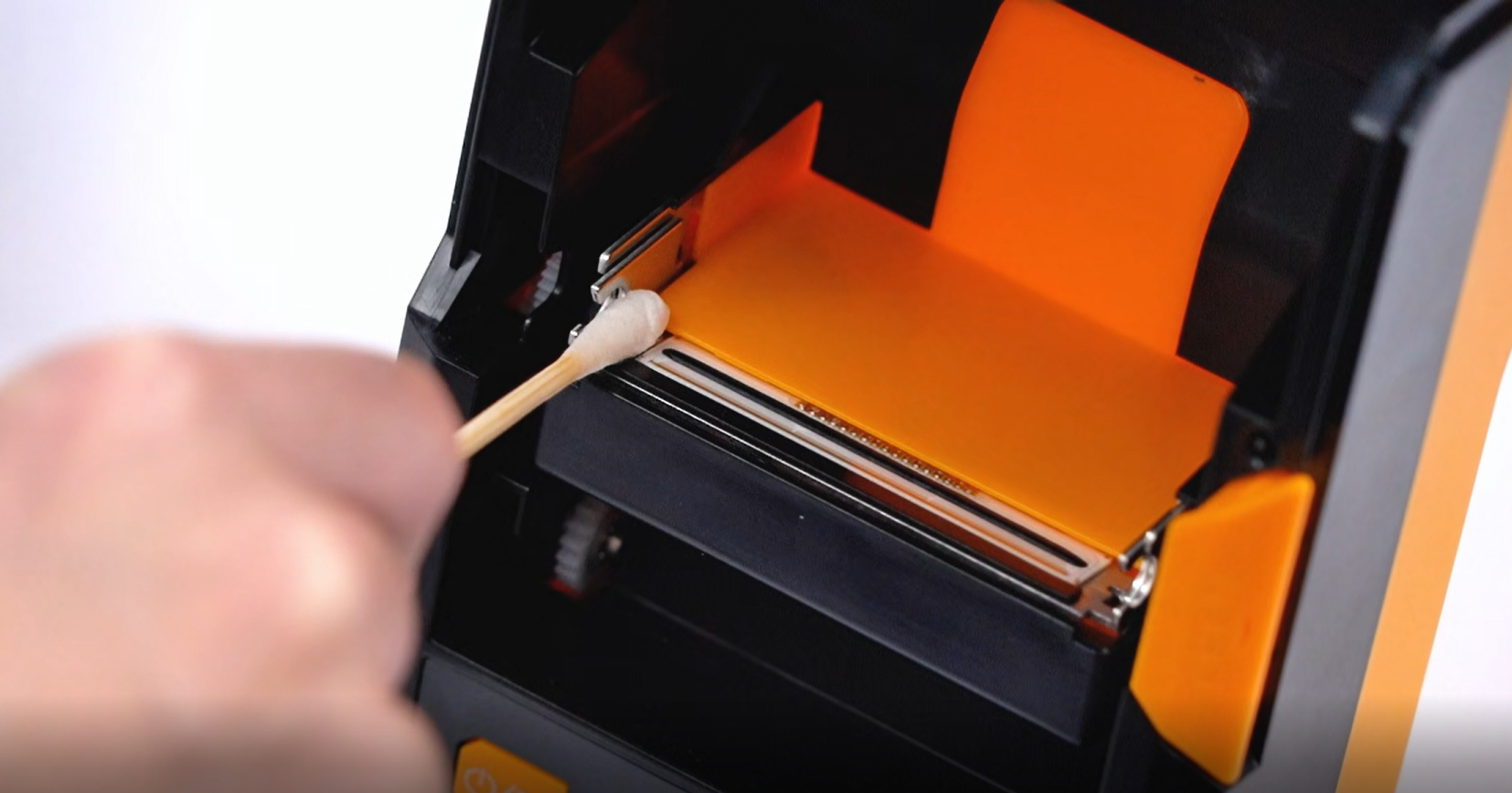 Wipe label printer head